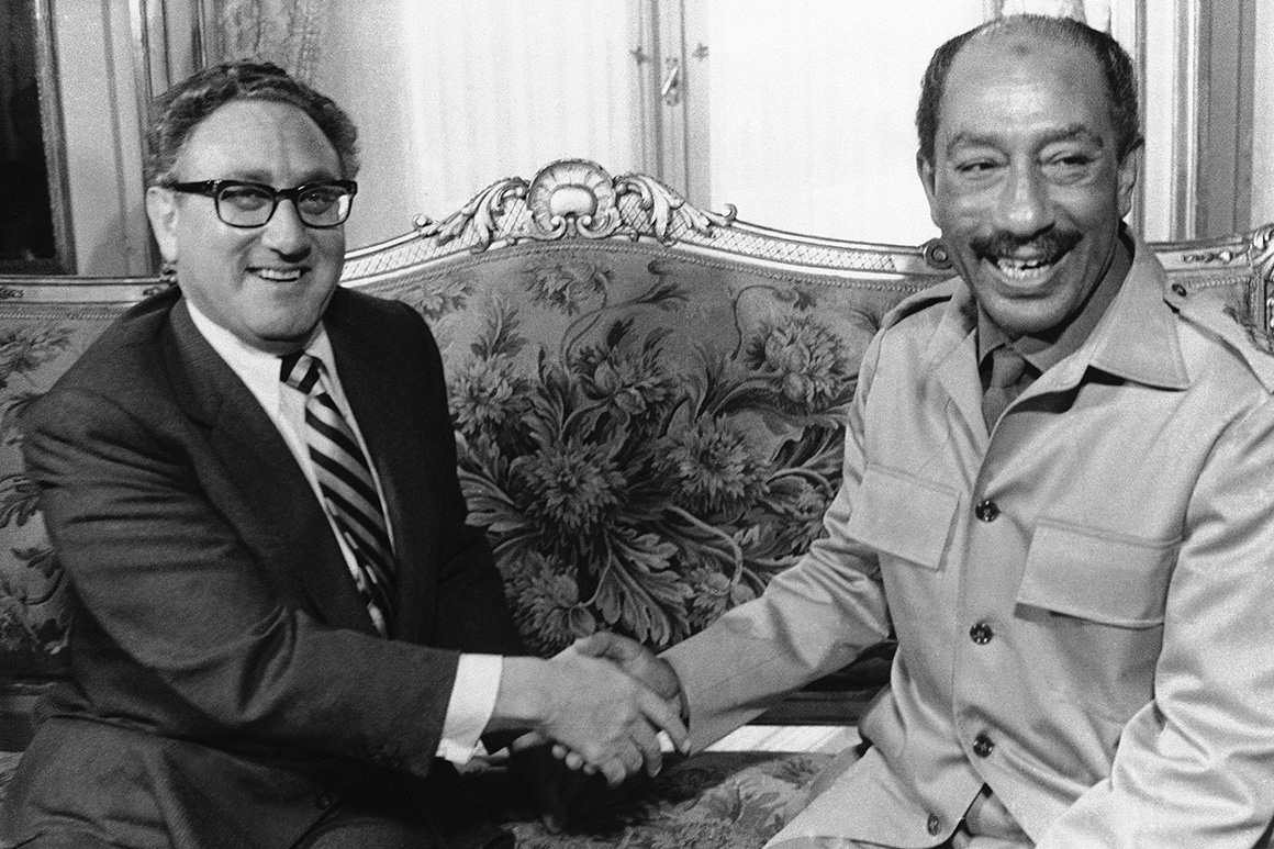 Kissinger and Sadat.