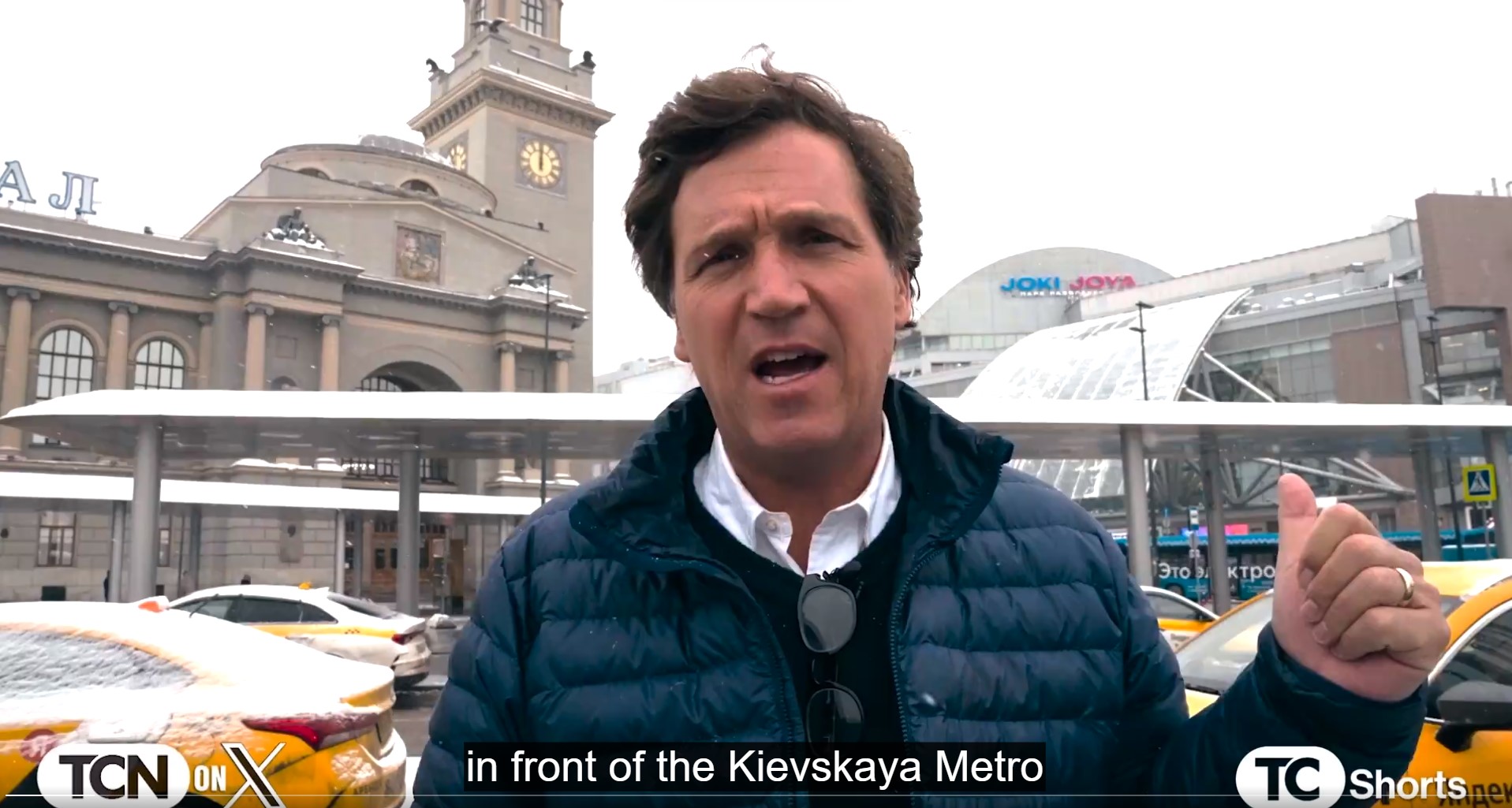 Tucker Carlson in front of the Kievskaya Metro station in Moscow. 