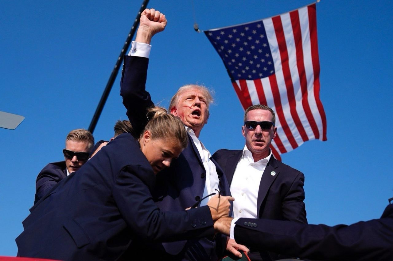 Trump stands defiant after the attempt on his life, in the immortal photo by AP photographer Evan Vucci. 