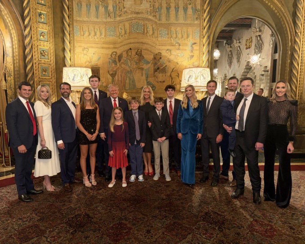 Trump with his family, Elon Musk and one of Musk's sons, after their historic victory. 