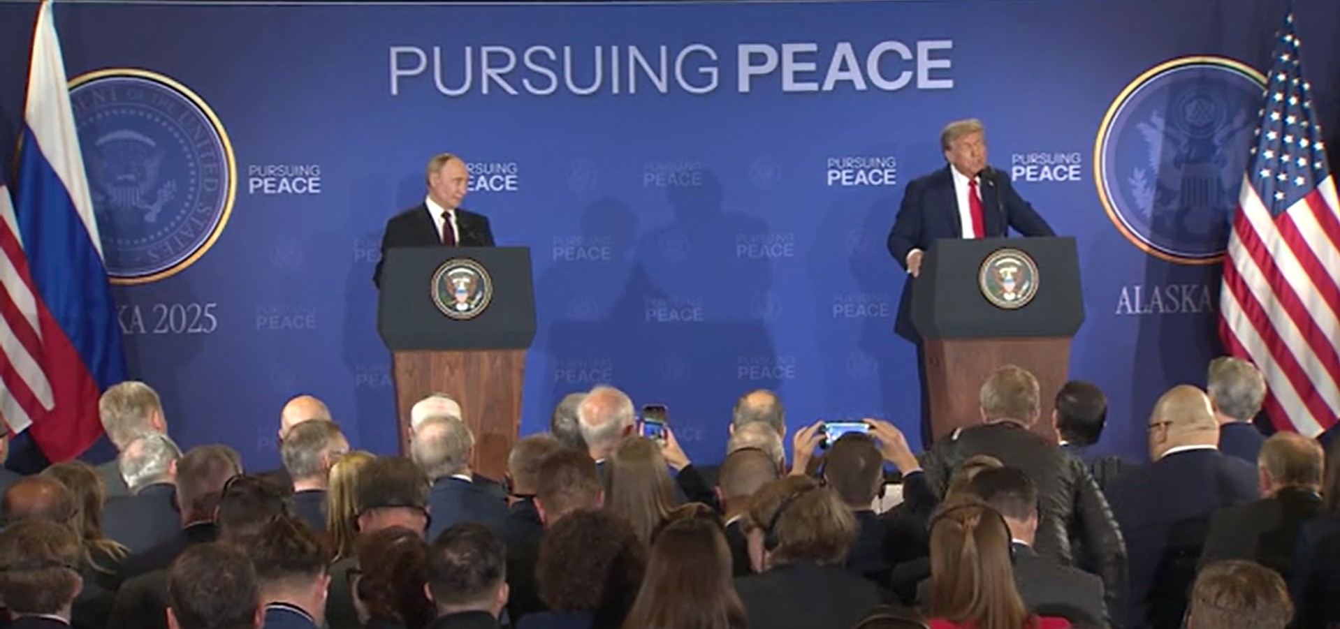 Putin and Trump at their press conference on Friday. 