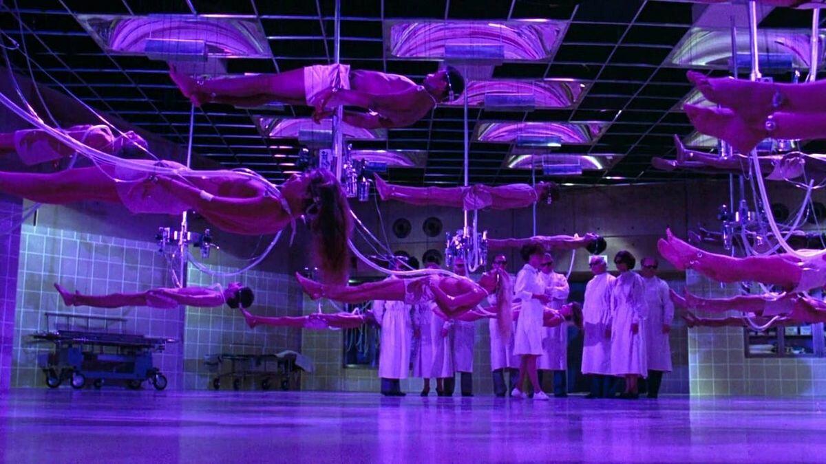 Comatose patients await organ harvesting in Michael Crichton’s Coma (1978).