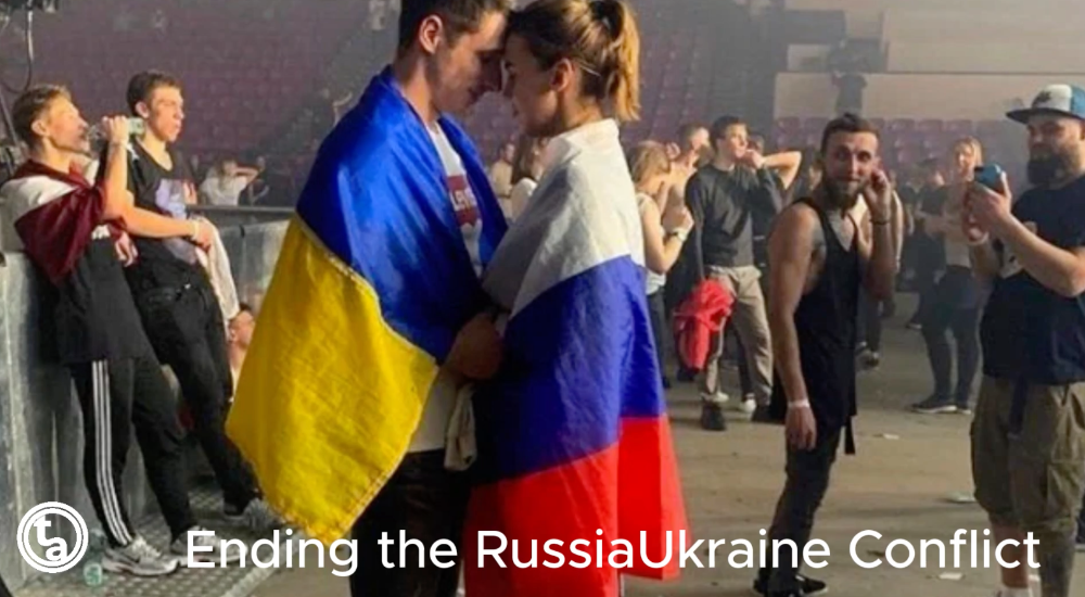 Boy and Girl with Russia and Ukraine flags wrapped around them embracing