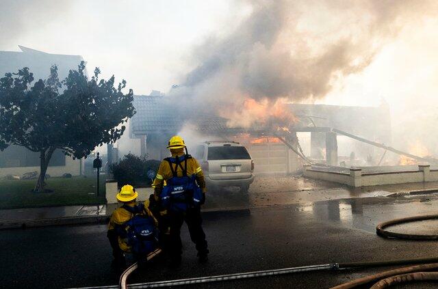 Evacuation Orders Issued As Wildfire Burns Homes In Southern California