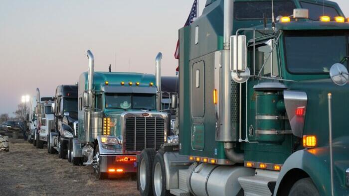 US Trucker Convoy Swells As It Moves Across Country To DC