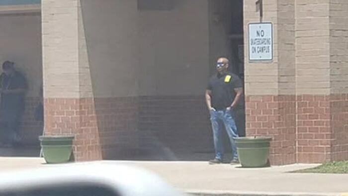 "I'm Watching": Image Of Father Standing Guard Outside Daughter's Elementary School Goes Viral - Vimarsana News
