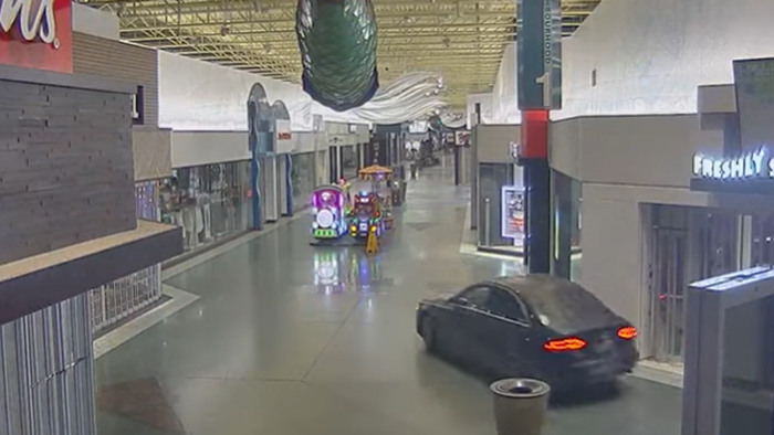 NextImg:Watch: Thieves Drive Through Mall In Stolen Black Audi After Robbing Electronics Store