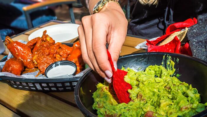 NextImg:Americans Hosting Super Bowl Parties Breathe A Sigh Of Relief After Chicken Wing, Avocado Prices Drop