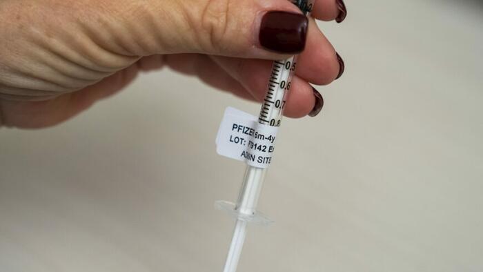 NextImg:Experts Want Labels For Pfizer, Moderna COVID-19 Vaccines Updated To Acknowledge Limitations