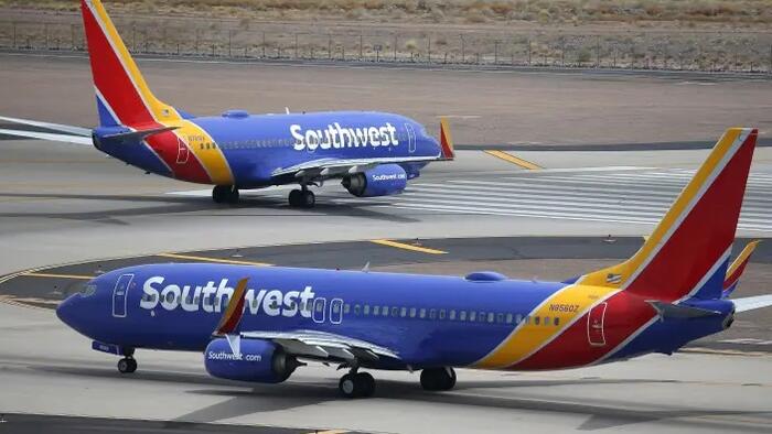 NextImg:Off-Duty Pilot Enters Southwest Cockpit To Help After Pilot Suffers Medical Emergency