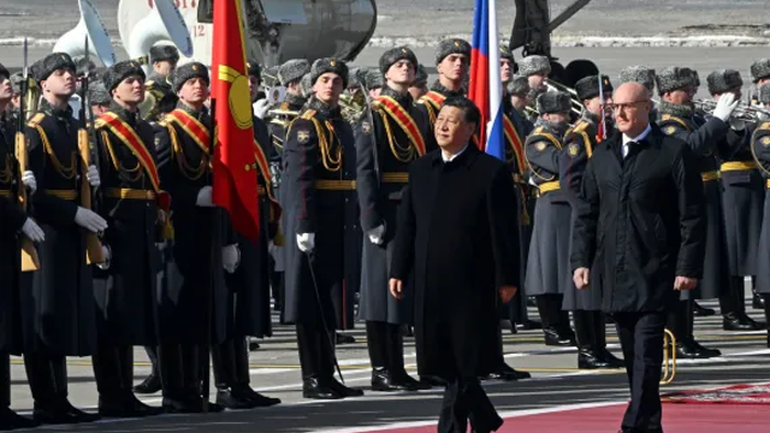 NextImg:Xi Arrives In Moscow As Putin Says Both Facing "Fierce & Aggressive" United States
