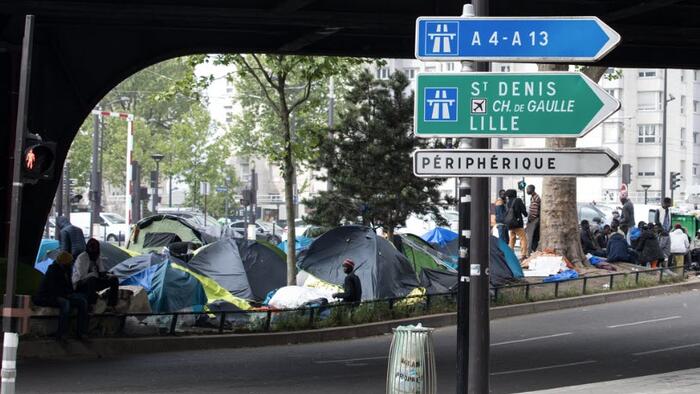 NextImg:France To Disperse Migrants From Paris To Countryside Ahead Of Rugby World Cup & Olympics