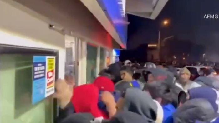 NextImg:Dramatic Video Shows Large Mob Looting Compton Gas Station