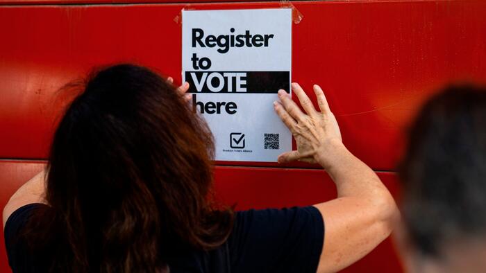NextImg:The Voter Registration Machine Flipping The States Blue