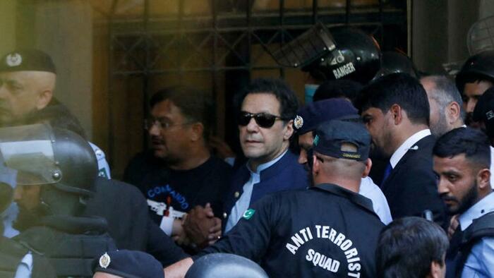 NextImg:Imran Khan Is In A Standoff With Police Who Have Surrounded His House