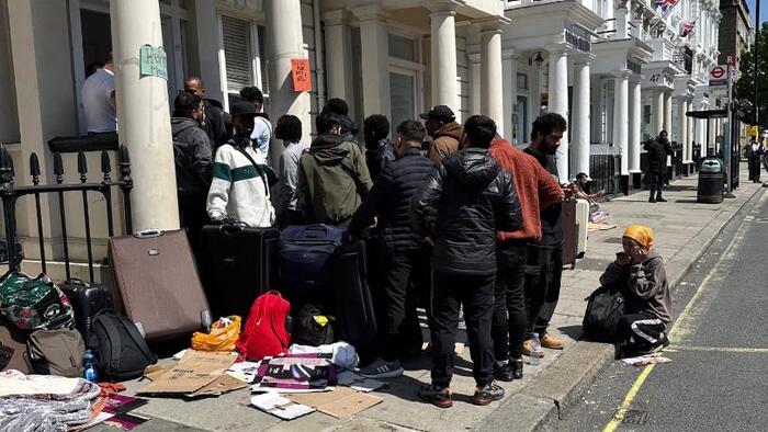 NextImg:Migrants Stage Pavement Protest Outside London Hotel Demanding Private Rooms, Better WiFi