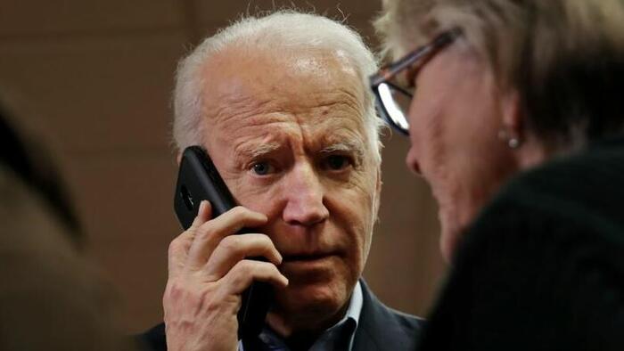 NextImg:Biden Picks Up After Journalist Calls Secret Burner Phone Revealed In Hunter Scandal