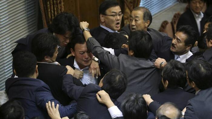 NextImg:Watch: Japan's Parliament Erupts In Scuffle Over Immigration Reform
