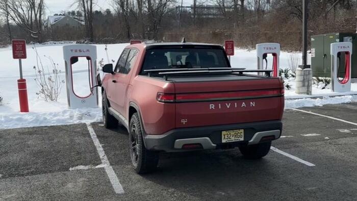 NextImg:Rivian Adopts Tesla's EV Charging Standard, Joining Ford, GM