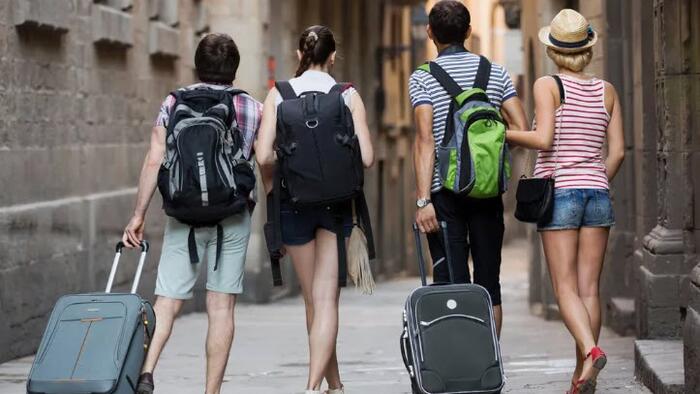 NextImg:Inflation Is Impacting Americans' Enthusiasm For Travel In 2023