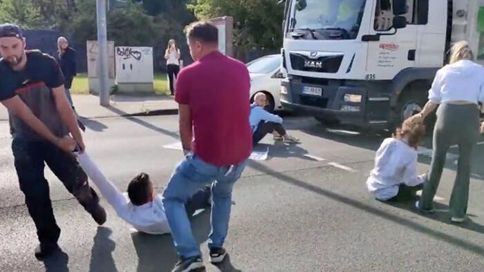 NextImg:Watch: Germans Have Had It With Eco-Protesters Sitting In The Road