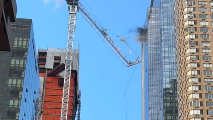 NextImg:Skyscraper Crane In Manhattan Bursts Into Flames, Collapses Onto Street