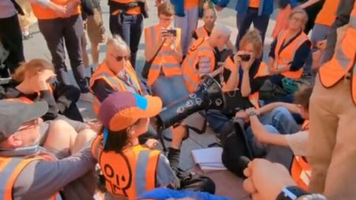 NextImg:"Just Stop Pissing Everyone Off": Citizen Heroes Confront Environmentalists' Traffic-Blocking Bull$hit