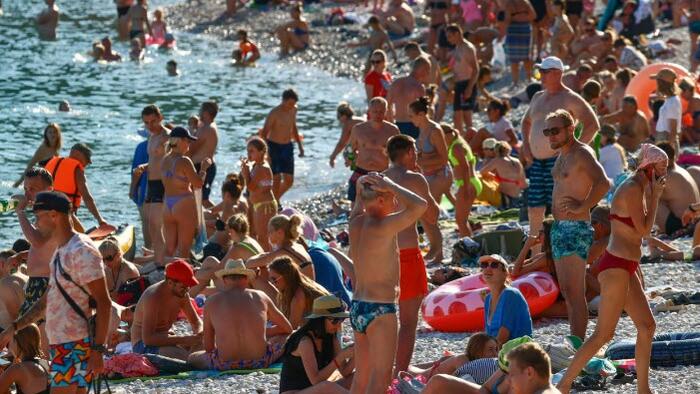 NextImg:Vacation For Me, Not For Thee: European Workers' Hard-Won Summer Vacation Tradition Is Slowly Being Taken Away