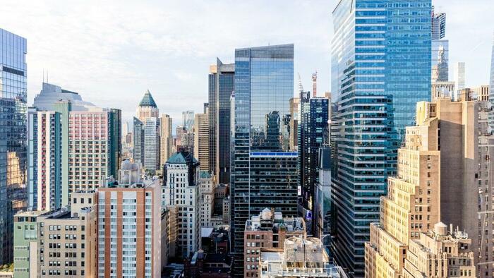 NextImg:New York Launches Plan To Rezone Midtown Offices To Houses
