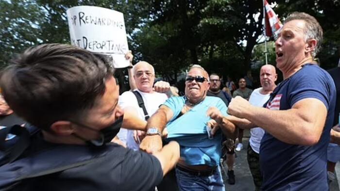 NextImg:Fists Fly, Bodies Slammed As Antifa Crashes Anti-Migrant Protest At NYC Mayor's Mansion
