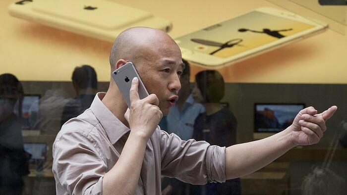 NextImg:Apple Tumbles Below Key Technical Level As China Broadens iPhone Ban
