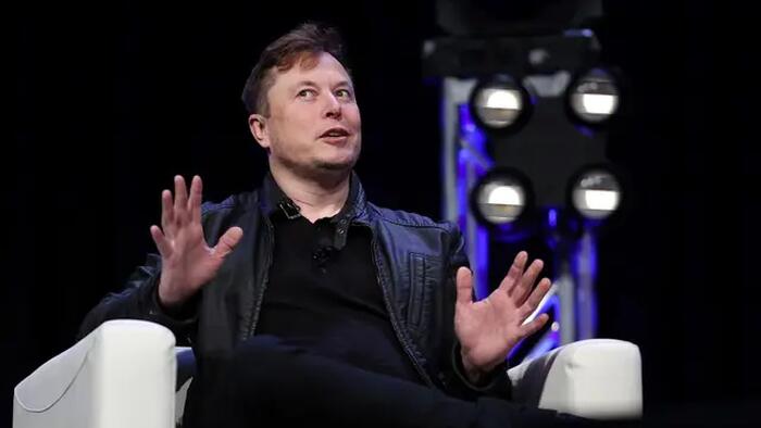 NextImg:Musk Says COVID Shot "Almost Sent Me To Hospital", Says He'd Go To Prison Before Firing Workers For Refusing Jab