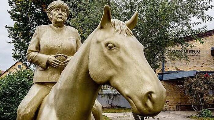 NextImg:Reeling Europe Crushed By Merkel's Catastrophic Legacy