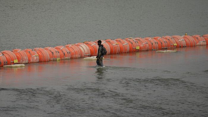 NextImg:Judge Orders Texas To Remove Floating 'Border Buoys' By Next Friday In Win For Biden DOJ