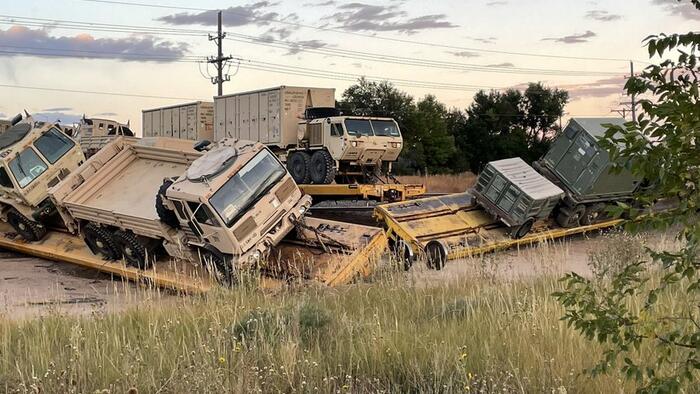 NextImg:"Cars Spinning Everywhere": Train Carrying Military Vehicles Derails In Colorado Springs