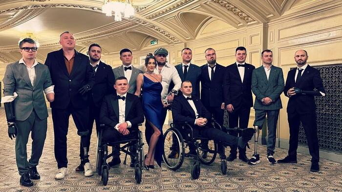 NextImg:Ukrainian Porn Star Poses With Mangled War Veterans For Charity Photo Shoot