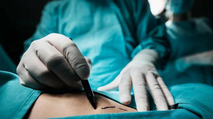 NextImg:Chinese Scientists Implant First Pig Liver Into Brain-Dead Human