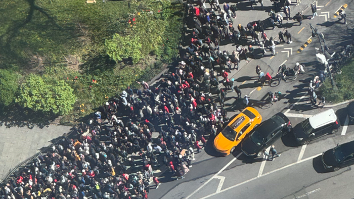 NextImg:Brink Of Unrest? Migrants "Flood" NYC City Hall In Protest Of Losing Luxury Hotel Rooms