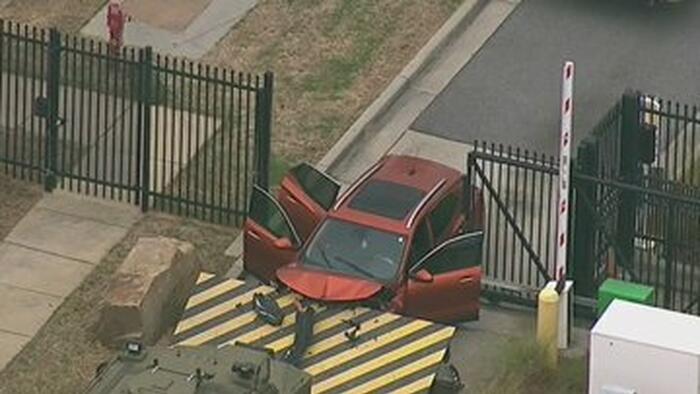 NextImg:SUV Rams Front Gate Of FBI Atlanta Headquarters