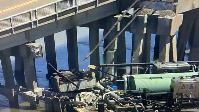 NextImg:Large Barge Slams Into Galveston Bridge, Stranding Thousands On Pelican Island