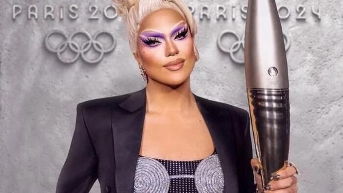 NextImg:Trans Sports Agenda: Drag Queens Carry The Olympic Torch To Launch Summer Games