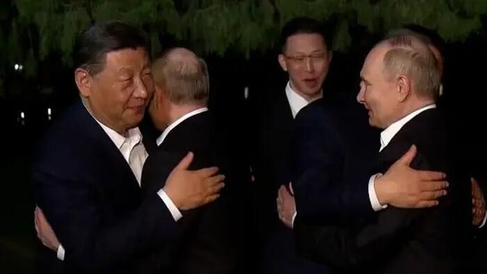 NextImg:White House Reacts To Ultra-Rare Putin-Xi Hug During Visit Highlighting Closer Military Ties