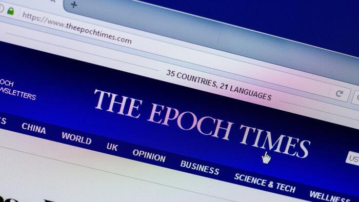 NextImg:Epoch Times CFO Accused Of Money Laundering