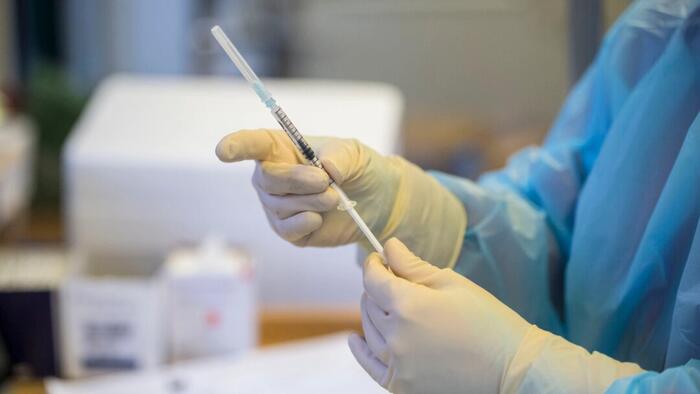 NextImg:State Supreme Courts Take Up COVID-19 Vaccine Cases