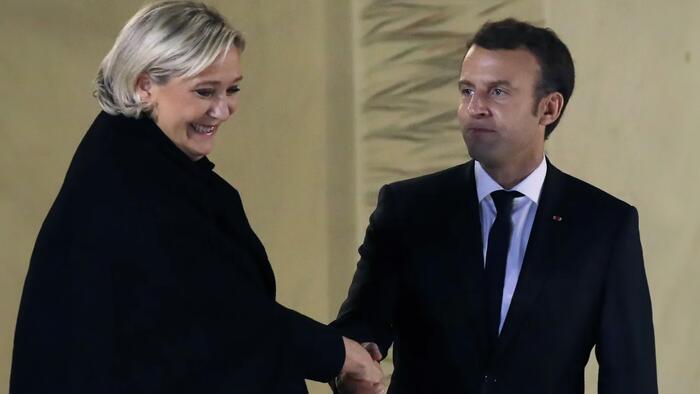 NextImg:French Markets Stabilize After Le Pen Says She'll Work With Macron In Appeal To French Moderates