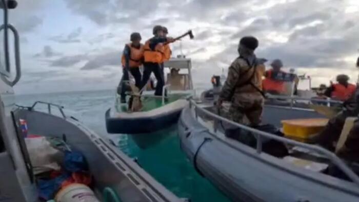 NextImg:Watch: Filipino Soldiers Fought Off Axe-Wielding Chinese Coast Guard 'With Bare Hands'