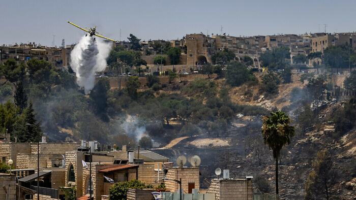 NextImg:New Fires Erupt In Israel After Hezbollah Sends 200 Rockets, Drone Swarms