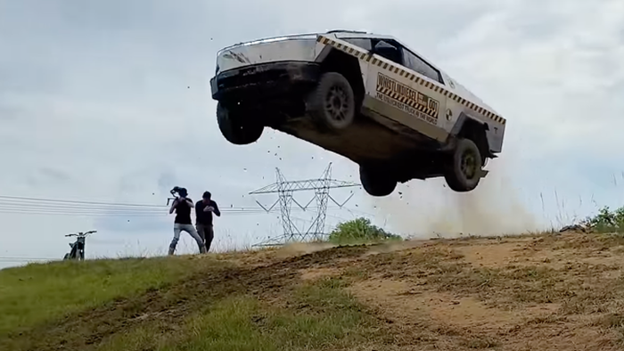 NextImg:YouTuber WhistlinDiesel 'Full Sends' Cybertruck Through Durability Test, Including 'C-4' Denotation