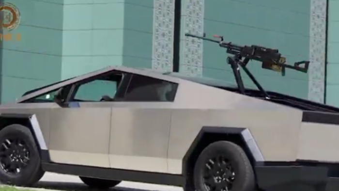 NextImg:Chechen Warlord Shows Off Cybertruck With Heavy Machine Gun Turret