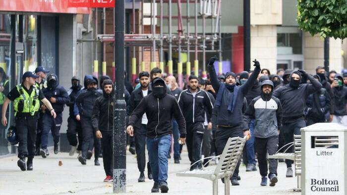 NextImg:Armed Migrant Gangs Stalk UK While Government Cracks Down On Native Brits